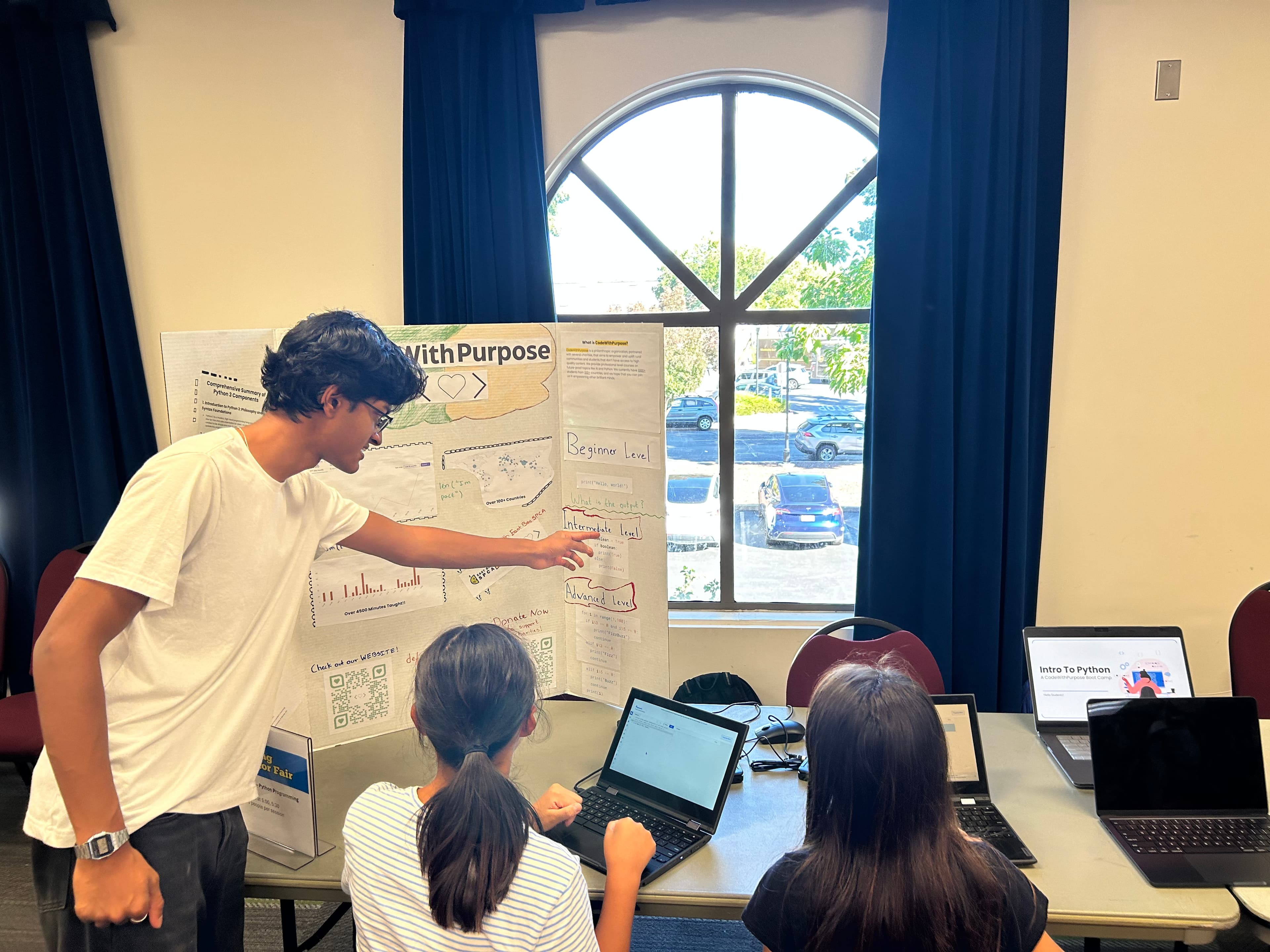 Volunteer presenting CodeWithPurpose curriculum to students